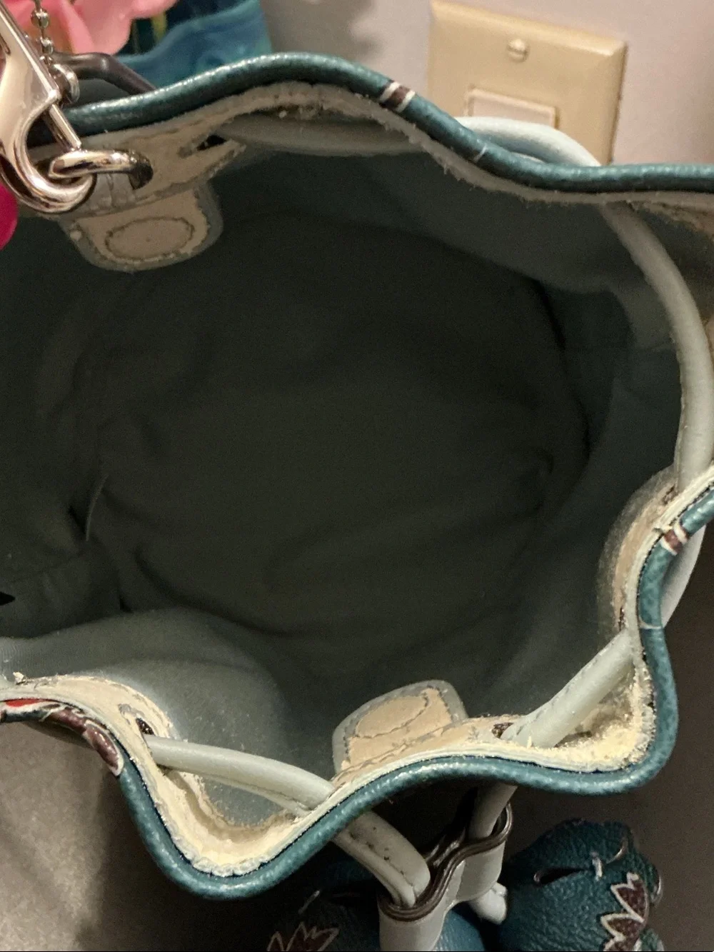 Coach Teal Floral Mini Drawstring Bucket Bag (rim has wear)
